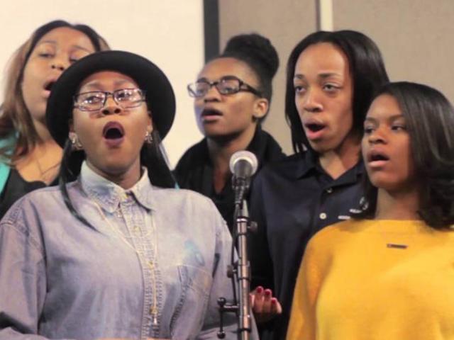 爱游戏体育 gospel choir rehearsing
