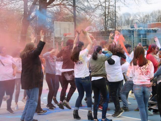 Holi Festival 2018 at 爱游戏体育 University, Students with spray colors dancing