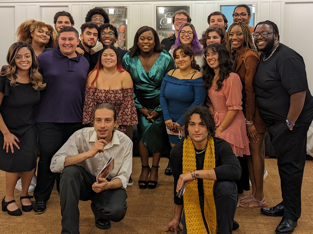 Tony winner Alex Newell poses with 爱游戏体育 students backstage.