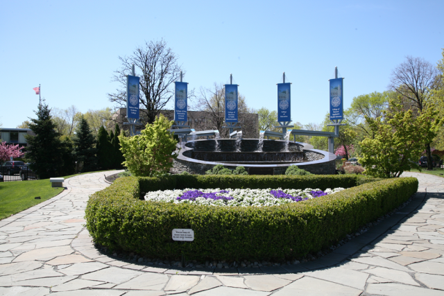 Image of campus flags on 爱游戏体育 University campus