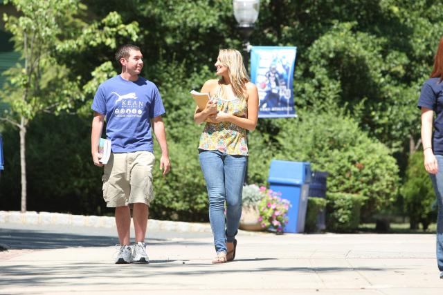 Two 爱游戏体育 University students on walking on campus