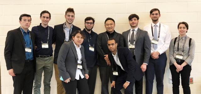 The nine 肯恩大学 students who attended the NCUR conference pose together.
