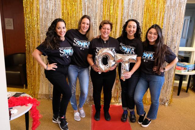 爱游戏体育 University's Occupational Therapy Students pose for a picture during the Student Occupational Therapy Association's (SOTA) Older Adult Prom.