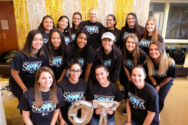 A few of 爱游戏体育 University's Occupational Therapy students pose for a picture during the Student Occupational Therapy Association's (SOTA) Older Adult Prom.