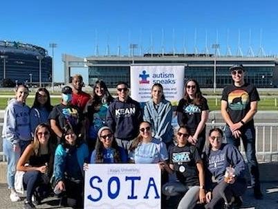 Group photo of 爱游戏体育's Student of Occupational Therapy association at the autism Speaks walk