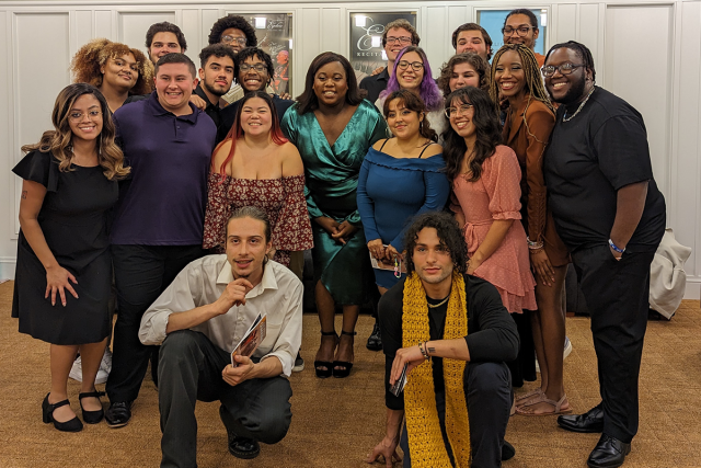 Tony winner Alex Newell poses with 爱游戏体育 students backstage.
