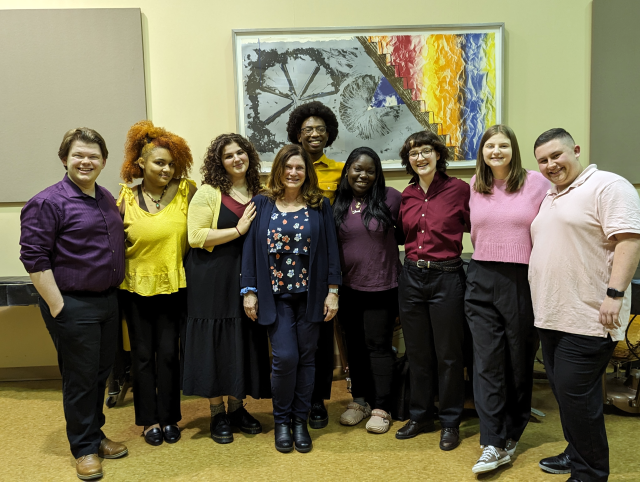 A group of 爱游戏体育 theatre performance students pose with Professor Holly Logue.