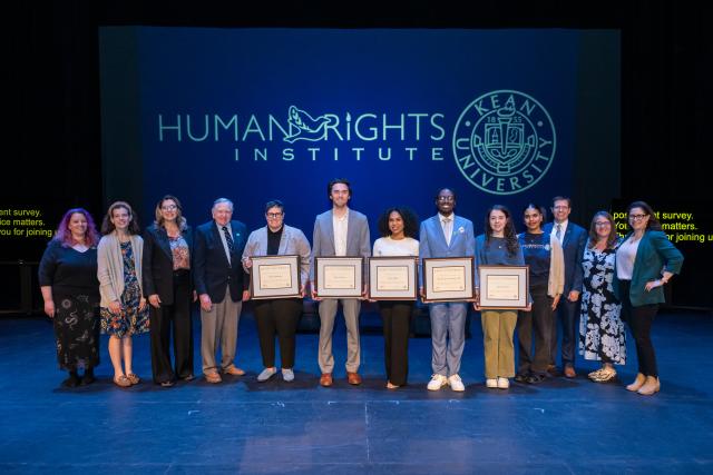 Award winners and organizers on stage at Human Rights Conference 2025