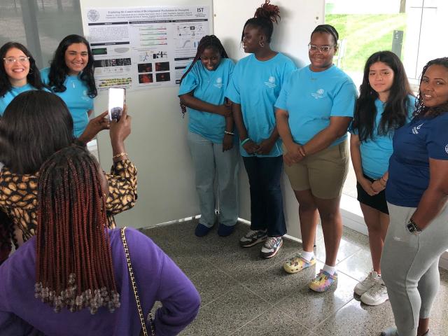 Students presenting poster